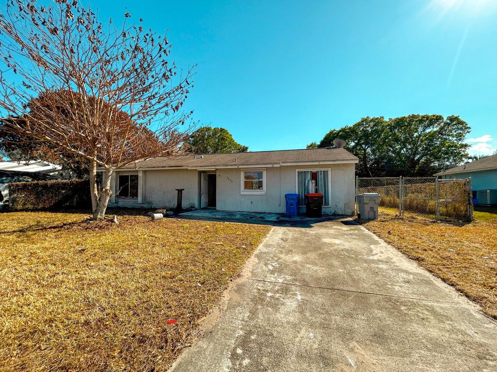 Photo of 1355 23rd Place SW, Vero Beach, FL 32962 (MLS # R11163539)