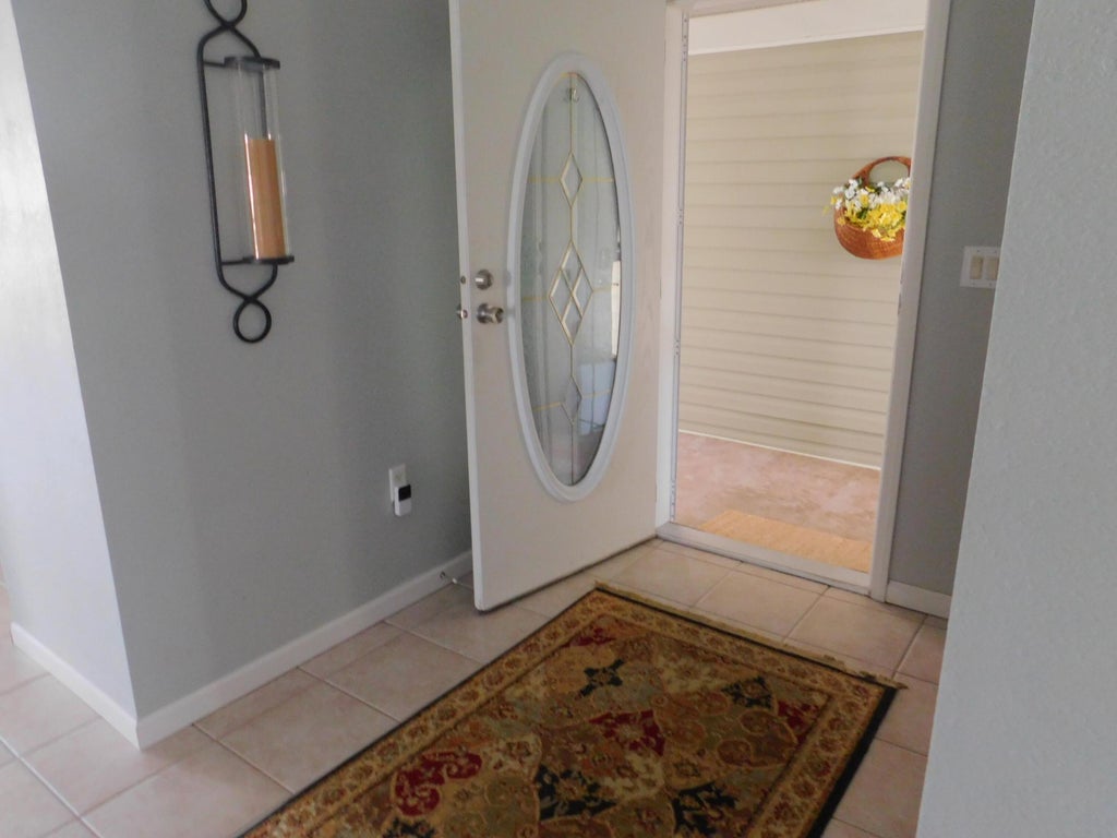 Photo of 525 Hemingway Terrace #9, Fort Pierce, FL 34982 (MLS # R10976534)