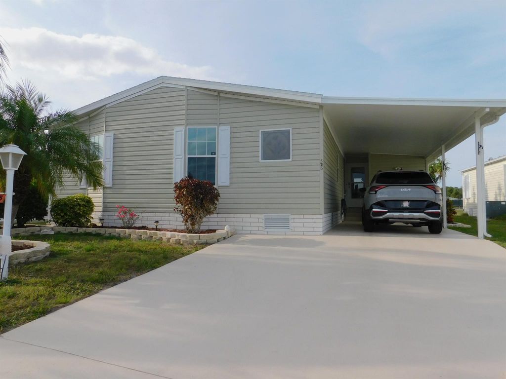 Photo of 525 Hemingway Terrace #9, Fort Pierce, FL 34982 (MLS # R10976534)