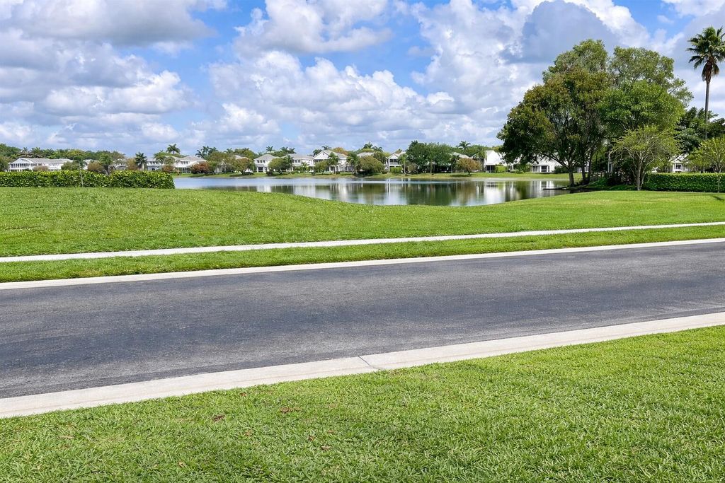 Photo of 10614 Lake Shore Drive, Wellington, FL 33414 (MLS # B26016478)