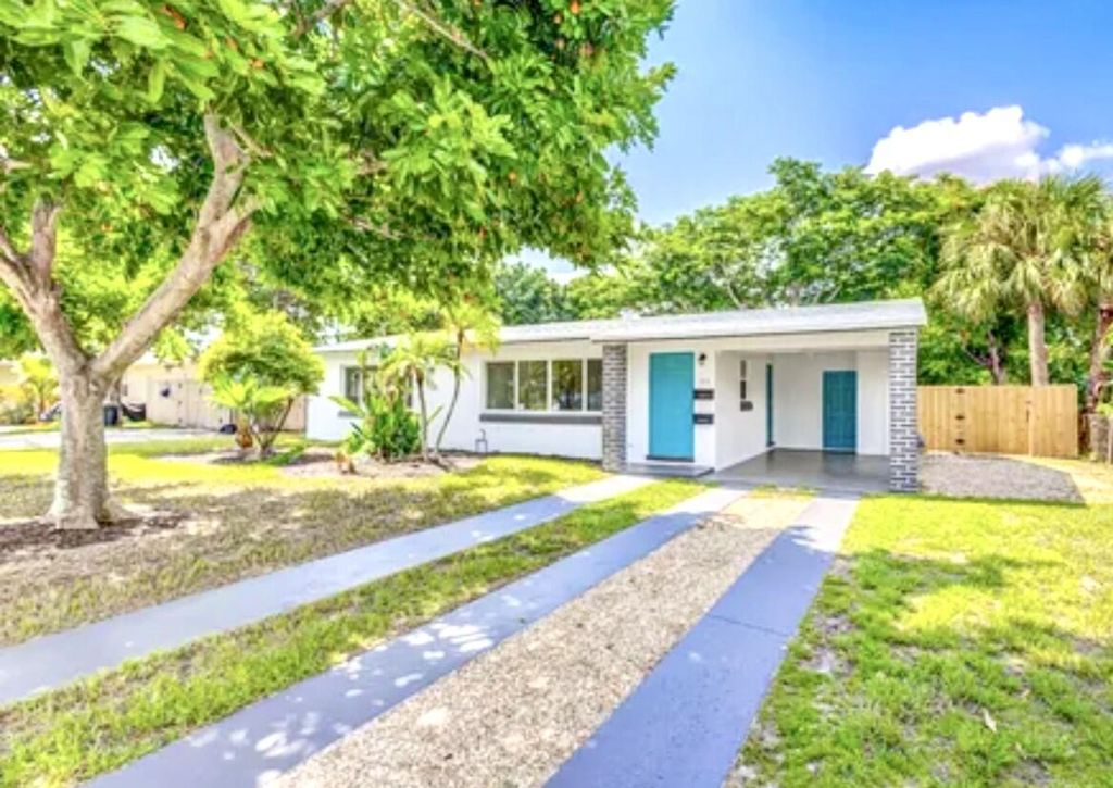 Photo of 512 Bayberry Drive, Lake Park, FL 33403 (MLS # R10990806)