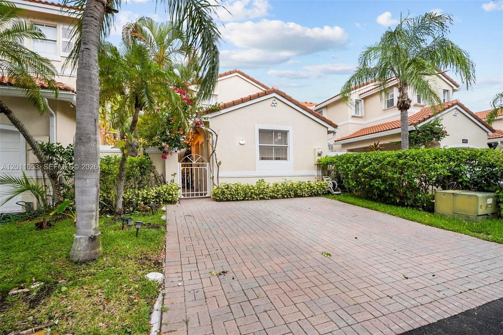 Photo of 1640 Weeping Willow Way #1640, Hollywood, FL 33019 (MLS # A12011053)