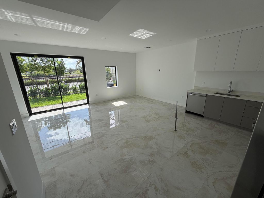 Photo of 111 NW 15th Court, Pompano Beach, FL 33060 (MLS # B26014004)