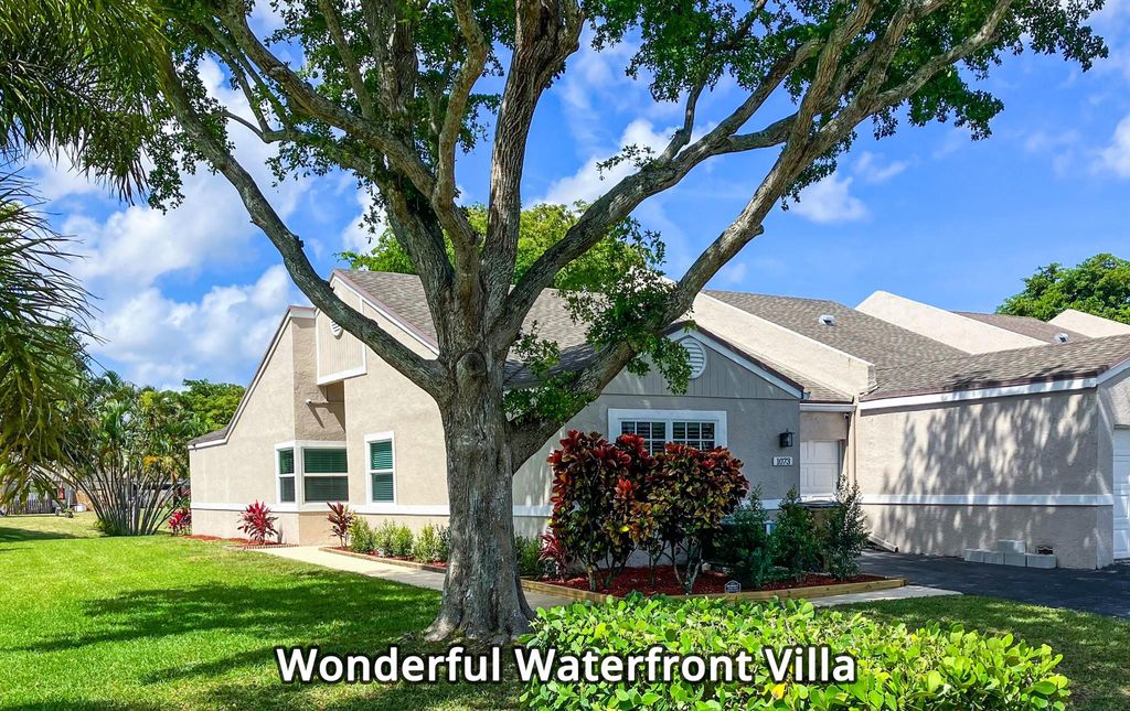 Photo of 1073 NW 50th Drive, Deerfield Beach, FL 33064 (MLS # R10995822)