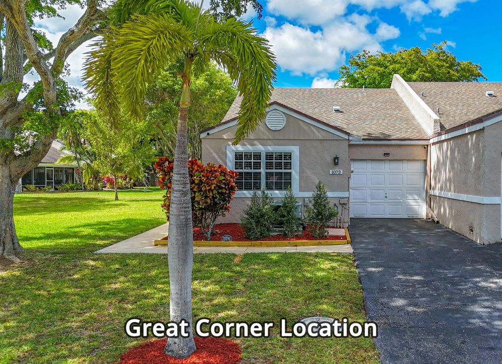 Photo of 1073 NW 50th Drive, Deerfield Beach, FL 33064 (MLS # R10995822)