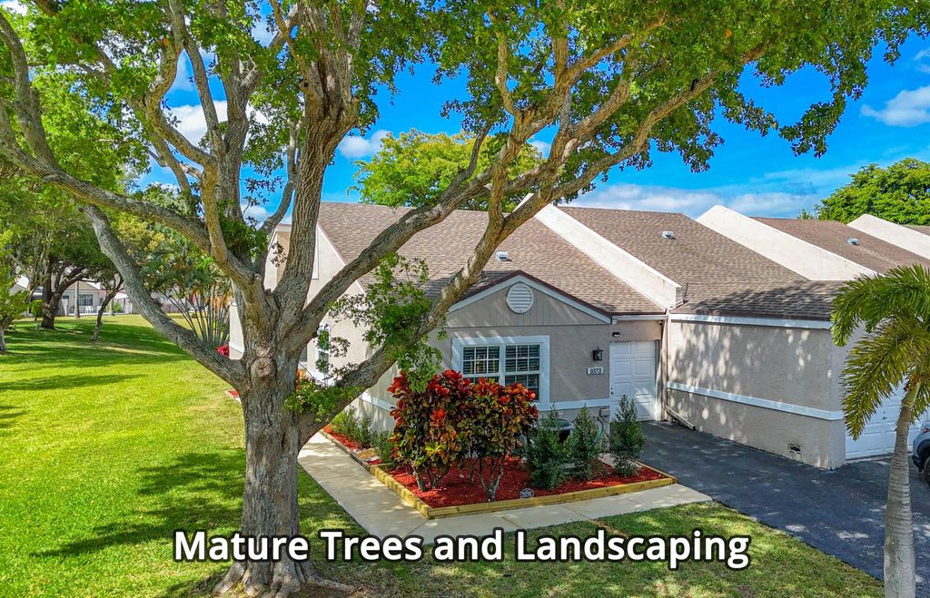 Photo of 1073 NW 50th Drive, Deerfield Beach, FL 33064 (MLS # R10995822)