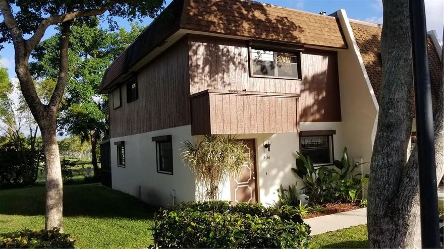 Look no further ! This corner unit is extremely clean. As you walk in, you will love the open concept living space. The view of West Lake park while siiting on the back screened porch and the feel of that east to west breeze will amaze you. HUGE master bedroom, newer ac, tank less hot water, newer roof, central vacuum, hurricane protection. Parking is at the front door, and the community pool is steps away. close to everything ! YOU CAN WALK TO THE BEACH IN 15 minutes !!!THIS WILL NOT LAST.