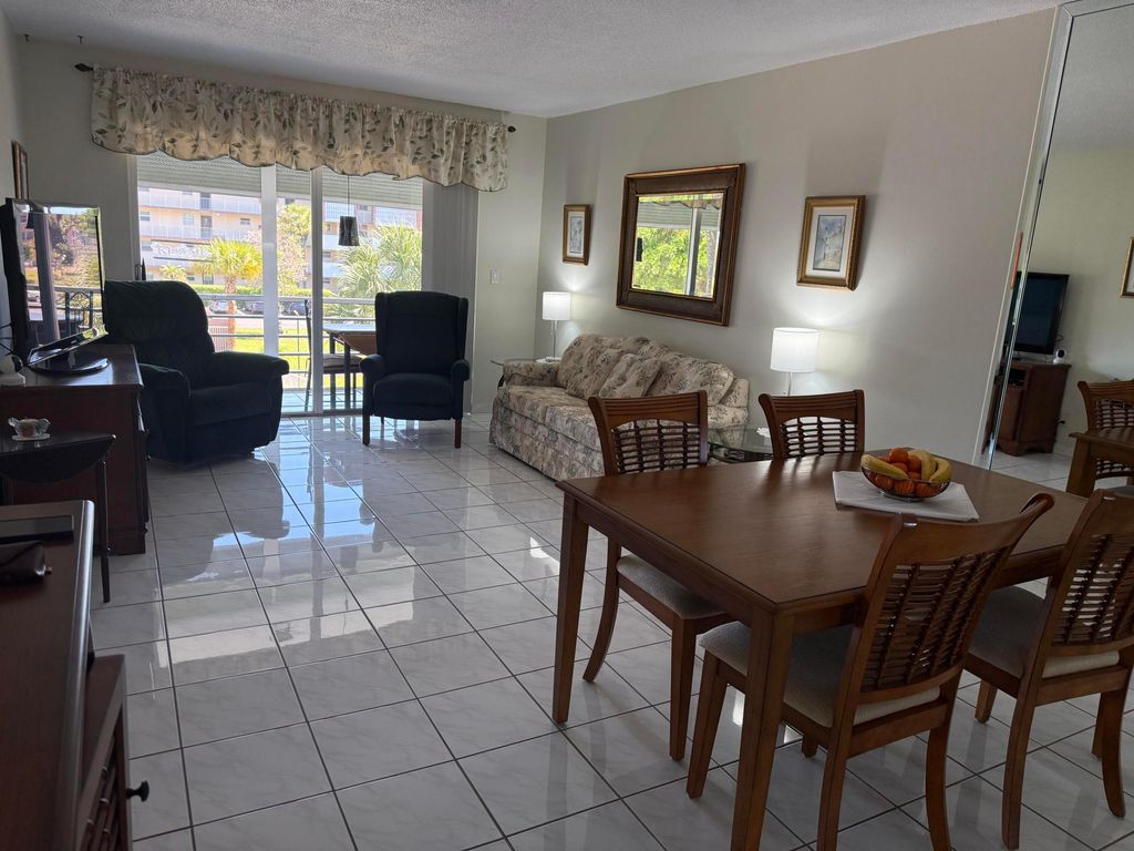 Photo of 2861 NW 47th Terrace #304b, Lauderdale Lakes, FL 33313 (MLS # B26005908)