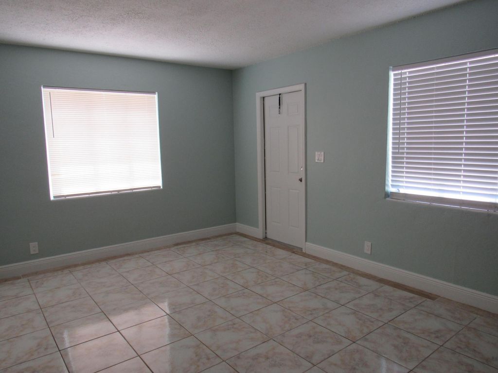Photo of 525 Worthmore Drive #1, Lake Worth Beach, FL 33460 (MLS # R10988877)