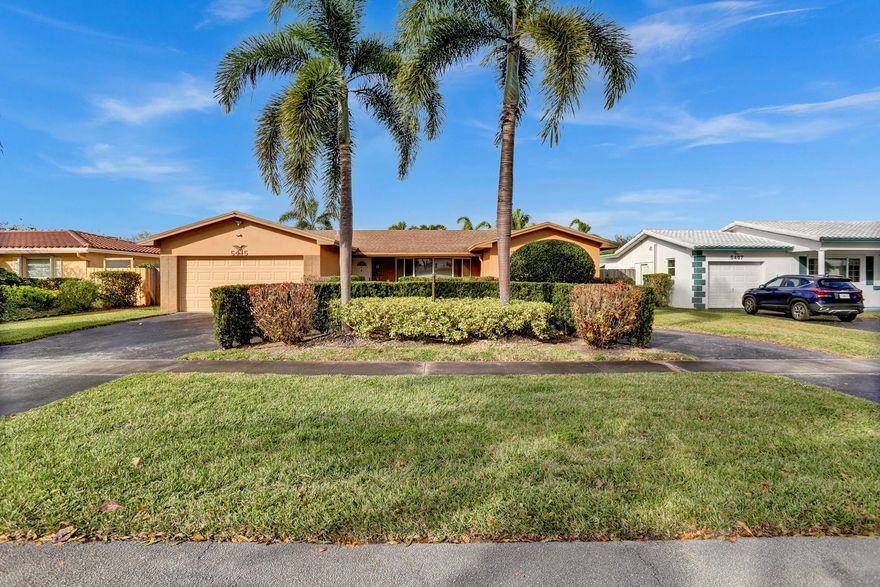 Check out this awesome remodeled home in Hollywood Hills! It features an amazing stamped concrete deck with a pool and spa on a fully fenced 9,380 sqft lot and a convenient back service alley. Plenty of parking with a circular driveway and a two-car garage. Humongous screened-in patio for outdoor events. Inside, you'll love the upgraded kitchen with stainless steel appliances, granite countertops, under-cabinet lighting, and a pass-through Family Room which can be easily converted into an extra bedroom. Remodeled master bath with a sleek walk-in shower. There's plenty of space with walk-in closets. Storm panels throughout. Plus, it's super close to all the amenities you need. Furniture is negotiable. Hurry! Priced to sell - won't stay long!
