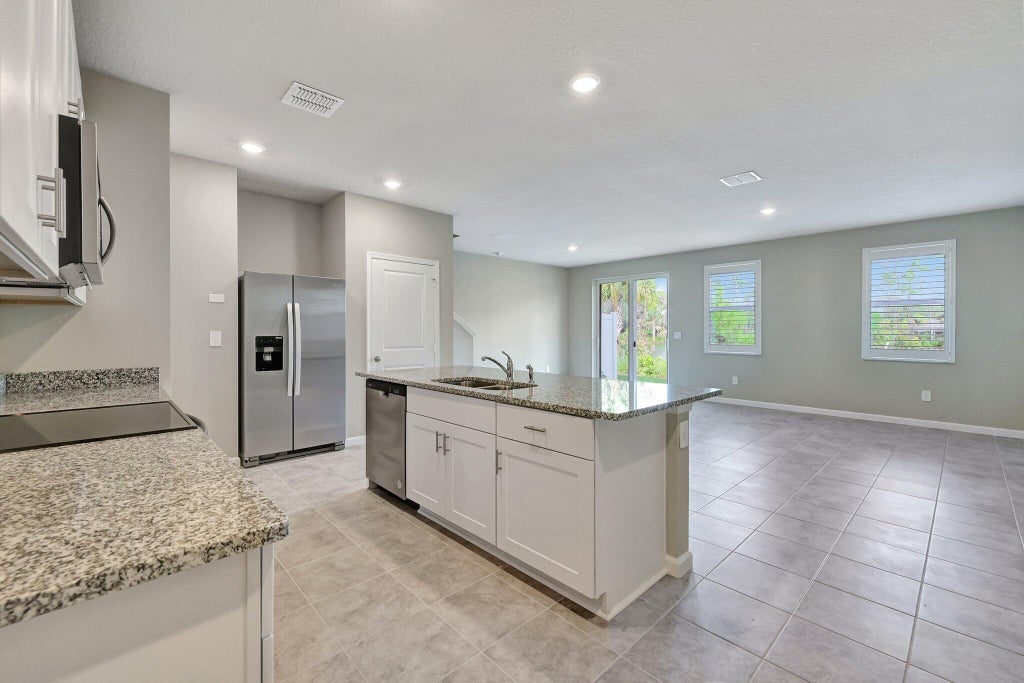 Photo of 5764 SE EDGEWATER Circle, Stuart, FL 34997 (MLS # B26081465)