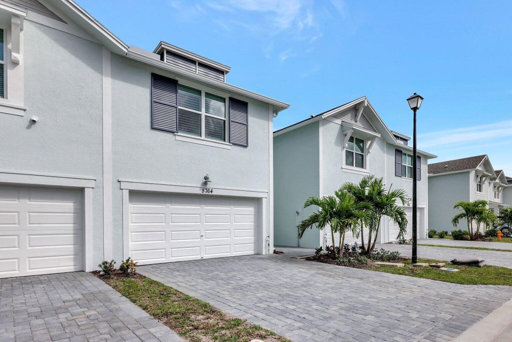 Photo of 5764 SE EDGEWATER Circle, Stuart, FL 34997 (MLS # B26081465)