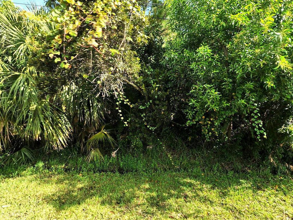 Photo of 13549 SW Oceanus Boulevard, Port St Lucie, FL 34987 (MLS # R10928590)