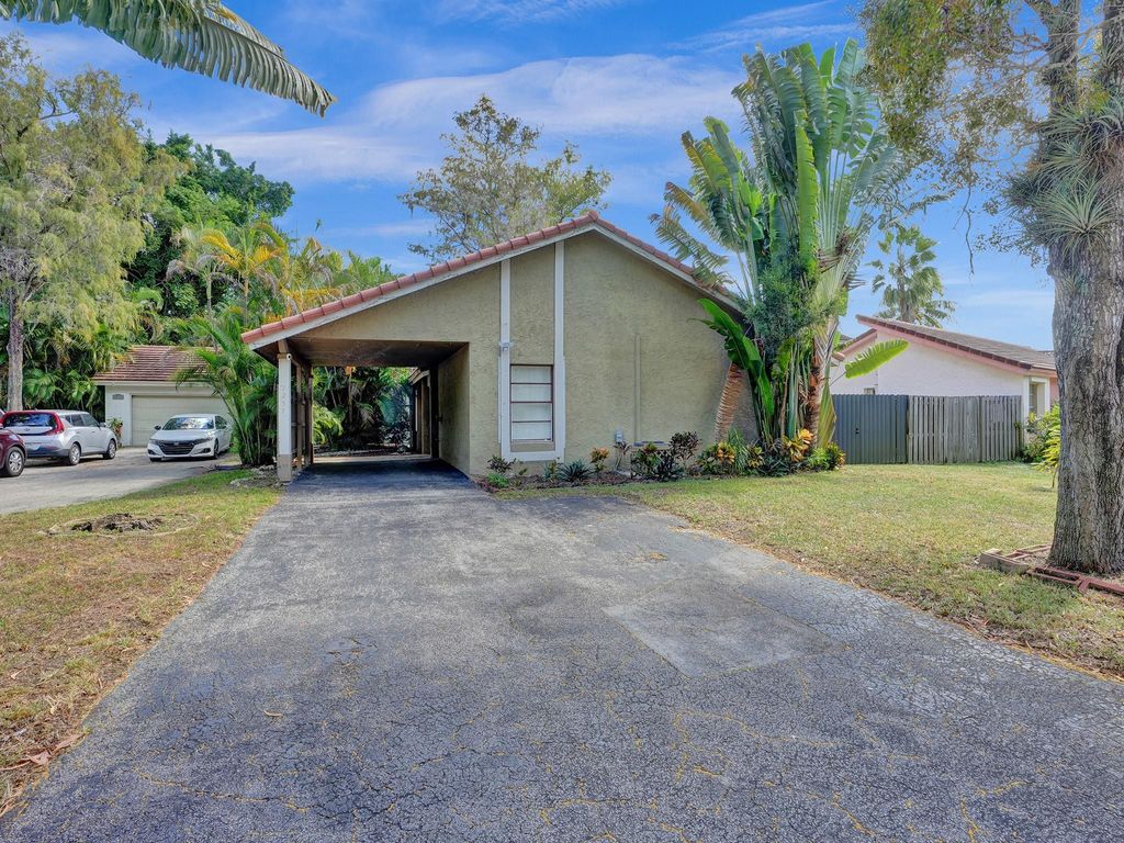 Photo of 1257 NW 91st Ave, Coral Springs, FL 33071 (MLS # F10540937)