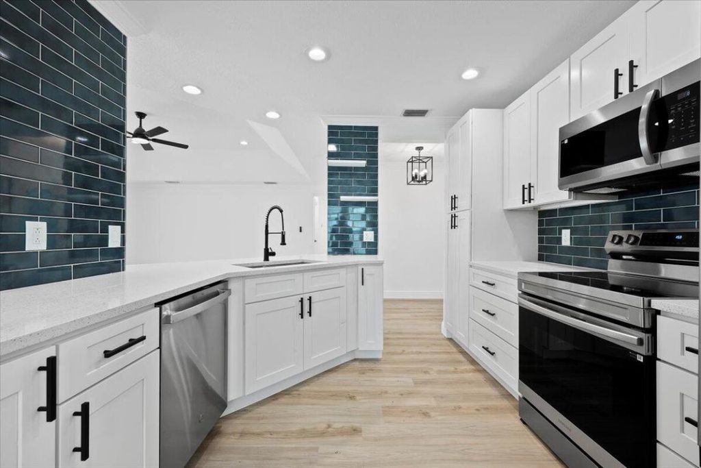 Photo of 8751 Sand Lake Court, Lake Worth, FL 33467 (MLS # R11110441)