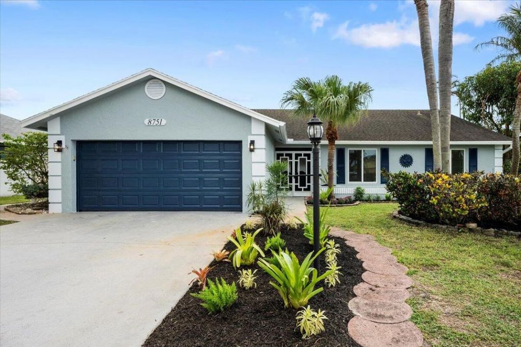 Photo of 8751 Sand Lake Court, Lake Worth, FL 33467 (MLS # R11110441)
