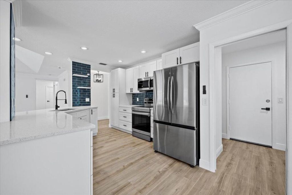 Photo of 8751 Sand Lake Court, Lake Worth, FL 33467 (MLS # R11110441)