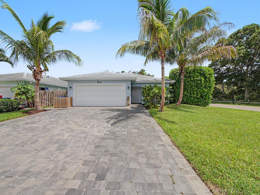 Photo of 17700 Cornelia Avenue, Jupiter, FL 33458 (MLS # B26071244)