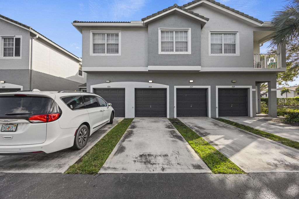 Photo of 3128 Grandiflora Drive, Greenacres, FL 33467 (MLS # R11150867)