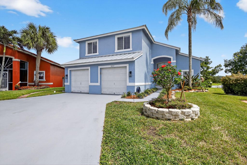Photo of 8225 Pelican Harbour Drive, Lake Worth, FL 33467 (MLS # R11109697)