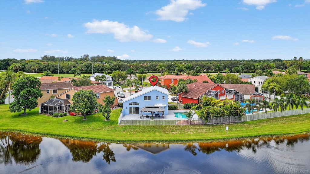 Photo of 8225 Pelican Harbour Drive, Lake Worth, FL 33467 (MLS # R11109697)