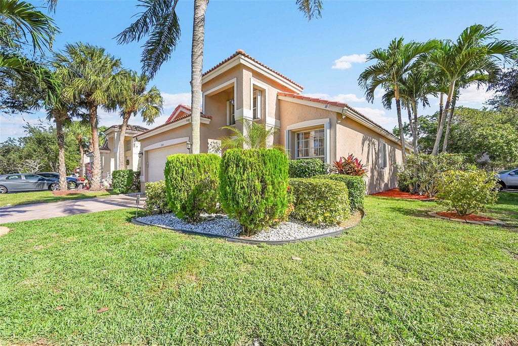 Photo of 5305 NW 126th Drive, Coral Springs, FL 33076 (MLS # F10540777)