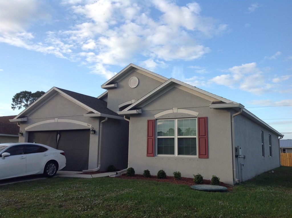 Photo of 349 SW Ray Avenue, Port St Lucie, FL 34983 (MLS # R10924520)