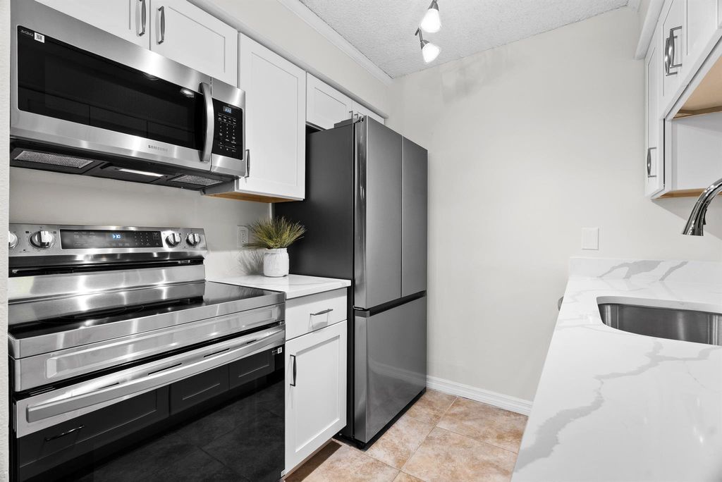 Photo of 6501 Chasewood Drive #18d, Jupiter, FL 33458 (MLS # R11112509)