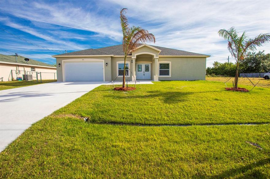 Magnificent New Construction!!! features Four bedrooms with waterproof vinyl floors and Three Full bathrooms, high ceilings, Porcelain tile, throughout with no carpet making easy to maintain. Large open concept,  Formal Living and Dinning Room, Family Room, kitchen with granite counter-tops, 42''Kitchen cabinets easy close, and stainless steel appliances, Dryer, Washer and utility Sink on the Laundry, All Impact Windows and Doors, Overside Driveway, A.C 5 Ton, The backyard is ready for entertaining with a nice space for building your pool.
**The lot next to the house is available for sale** for more info contact Listng Agent MEASUREMENTS AND DETAILS TO BE VERIFIED BY BUYER