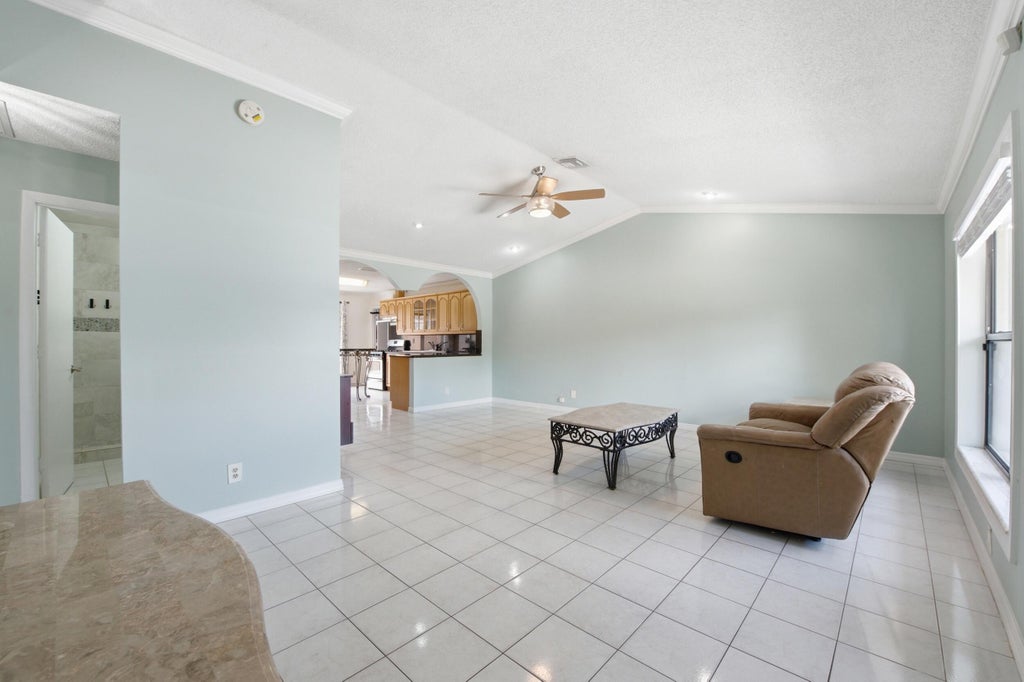 Photo of 5814 Ithaca Circle E, Lake Worth, FL 33463 (MLS # B26049099)