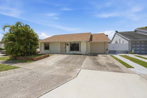 Photo of 5814 Ithaca Circle E, Lake Worth, FL 33463 (MLS # B26049099)