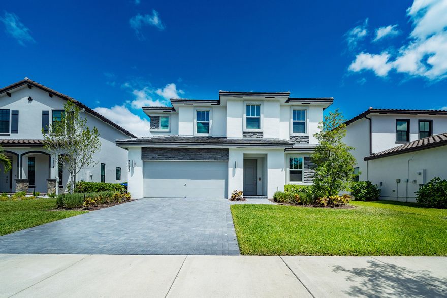 Welcome to Bellaserra, a newly-built community that provides owners with the modern, advanced homes many are looking for today. Within, you will find the rare opportunity to own this turn-key abode, updated meticulously for the new, premium owner. With over 2,500 square feet of pure living space, this hurricane-proof home contains a total of 4 bedrooms, 3 full bathrooms, and 1 half bathroom beautifully designed to allow guests to use. With a neutral ambience throughout, you will appreciate the designer features laid upon, such as the ceramic floor tiles and plush stain resistant carpeting. CONT... Enjoy the fully-upgraded kitchen in which you will have the luxury to keep the advanced refrigerator, microwave, and conventional, self-cleaning oven. In addition, you will have a modern washer and dryer awaiting your arrival. This smart home contains immaculate features that places an emphasis on the luxury lifestyle. With over $150,000 in precise upgrades, this home contains a solar system that amounts to approximately $60/month for FPL, freshly painted walls with new crown molding, an advanced nest thermostat system, a Ruckus internet wireless system, an electronic key door with a ring doorbell, and a Tesla charger to provide for the advanced, Tesla users. Venture out to the fenced-in backyard and immerse yourself in a scenery large enough to create your own layout. To maintain this yard, sprinklers are placed all throughout to provide the pure and fresh look. Don't miss out on the opportunity to view this exquisite home.