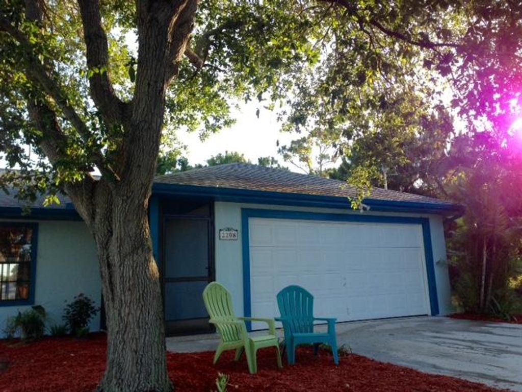 Photo of 2208 SE Trillo Street, Port St Lucie, FL 34952 (MLS # R11066905)