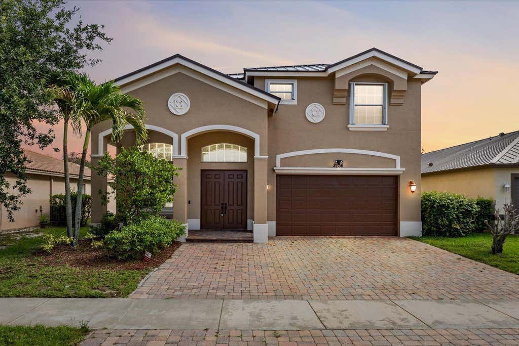 Photo of 2166 SW NEWPORT ISLES Boulevard, Port Saint Lucie, FL 34953 (MLS # B26052898)