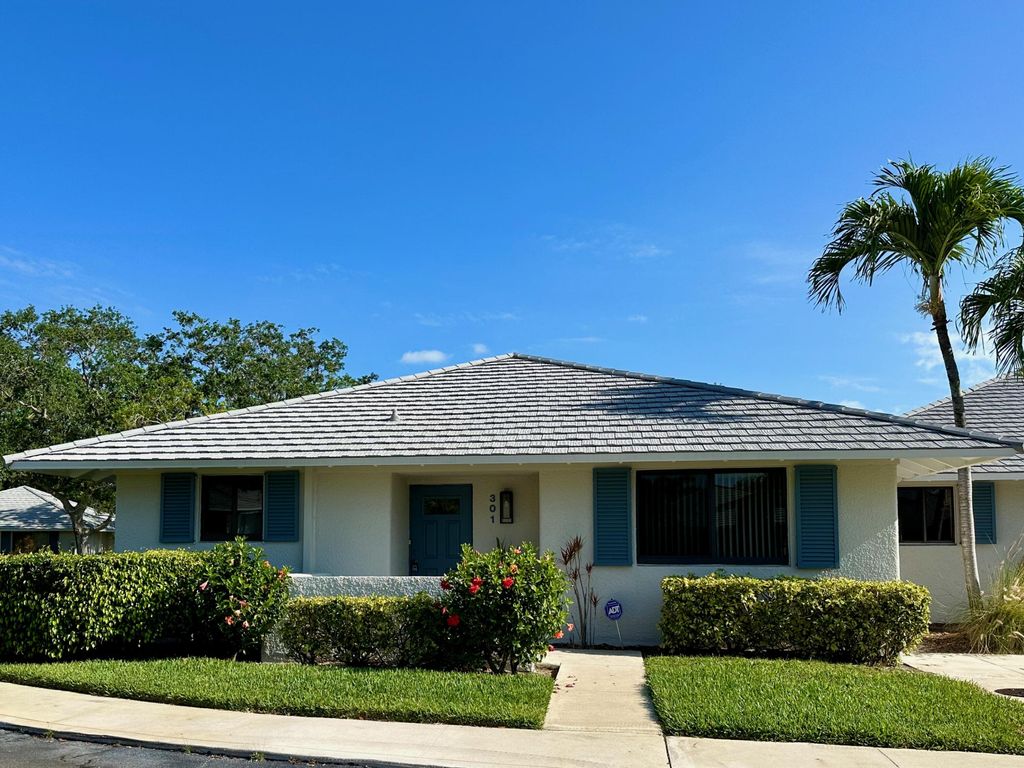 Photo of 301 Club Drive, Palm Beach Gardens, FL 33418 (MLS # R11150019)