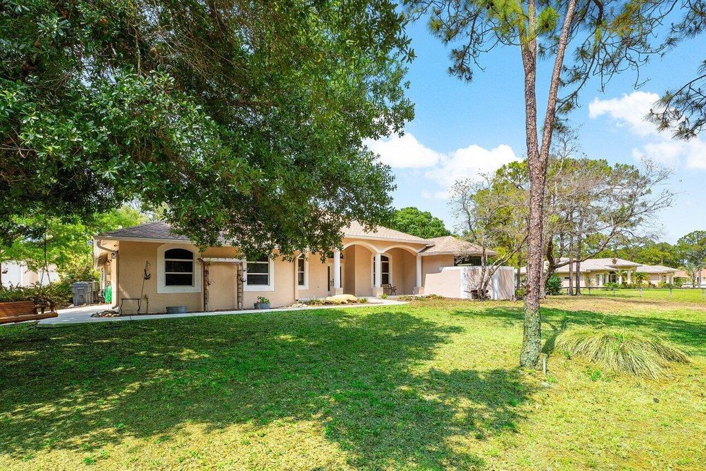 Photo of 16737 Temple Boulevard, Loxahatchee, FL 33470 (MLS # R11089006)