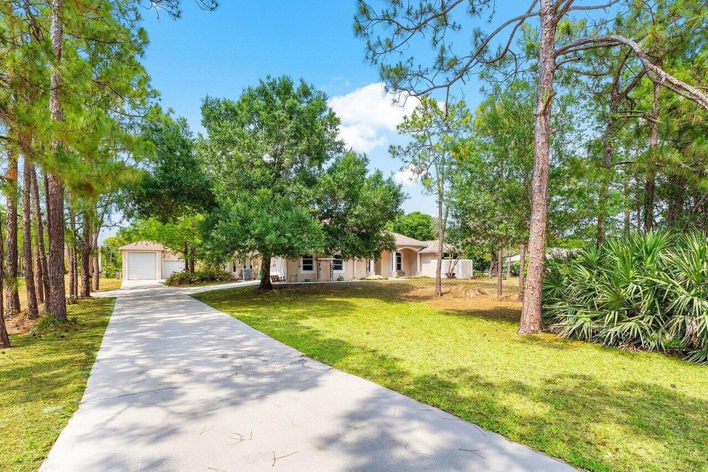 Photo of 16737 Temple Boulevard, Loxahatchee, FL 33470 (MLS # R11089006)