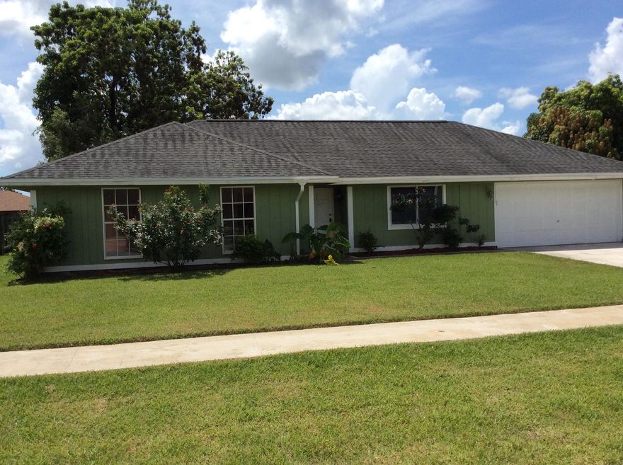 3/2 NO HOA single family home located in heart of Wellington. Fresh paint and new laminate floors in two of the three bedrooms, Tile in the rest of house. Large covered back patio with fence yard. Upgraded kitchen and stainless steel appliances .
All sizes approximate.