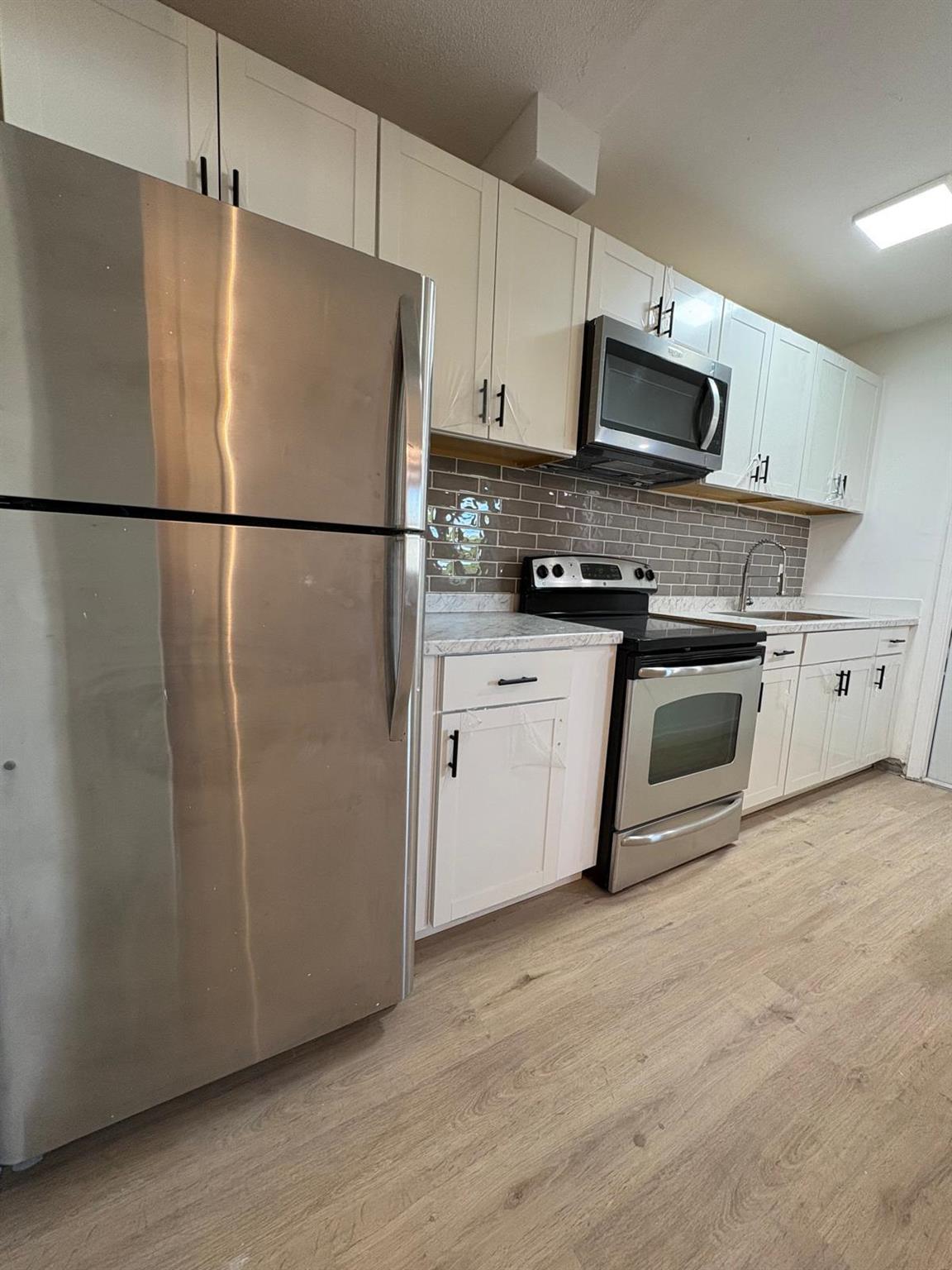 CARRIAGE LIGHT CONDO - Residential Lease