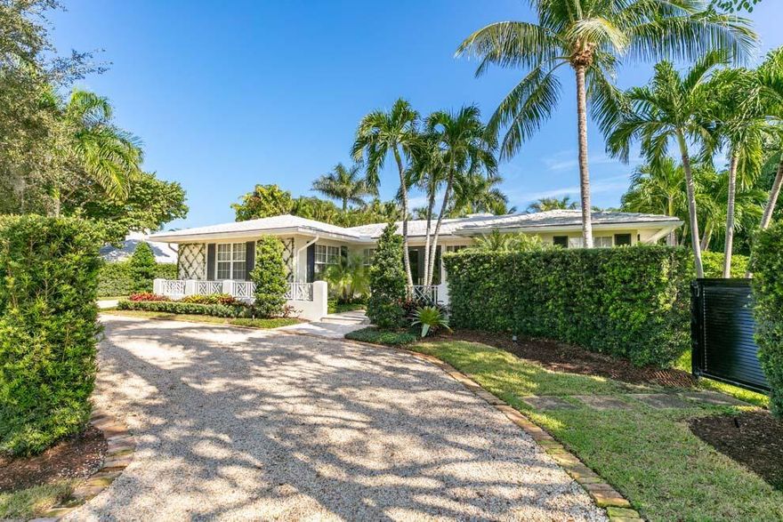 Amazing Gulf Stream home on corner lot. Great living areas and spacious grounds with pool and terrace.