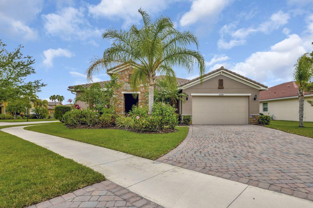 Photo of 11251 SW Apple Blossom Trail, Port Saint Lucie, FL 34987 (MLS # R11104206)