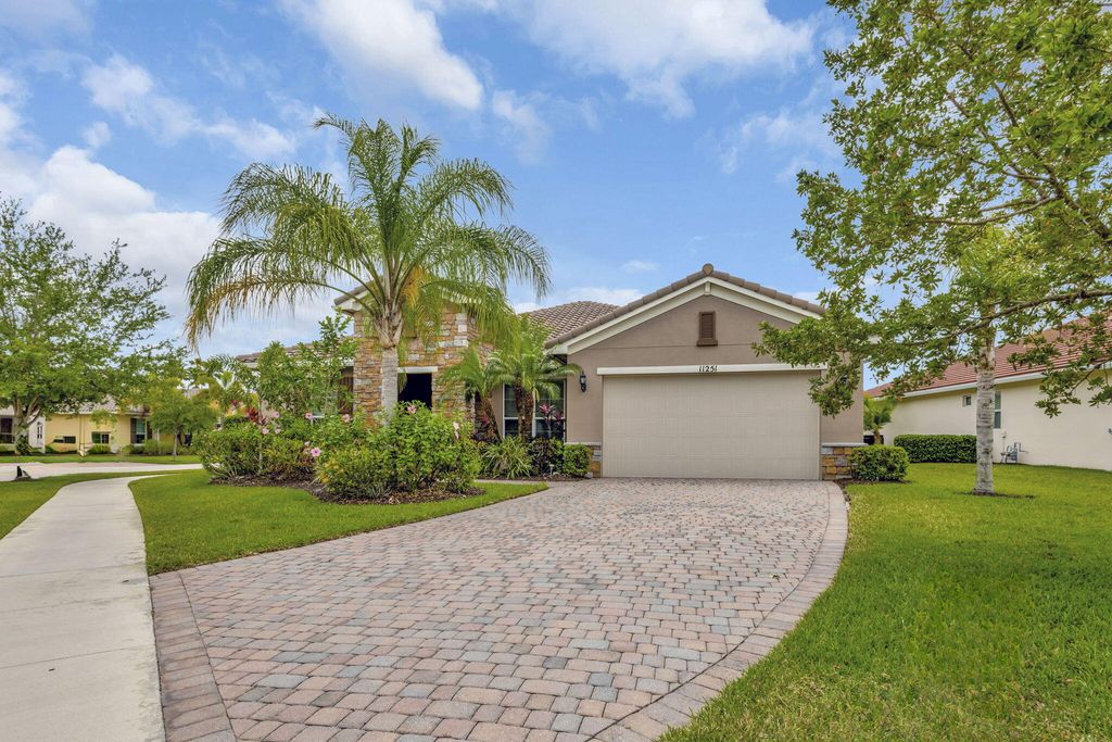 Photo of 11251 SW Apple Blossom Trail, Port Saint Lucie, FL 34987 (MLS # R11104206)