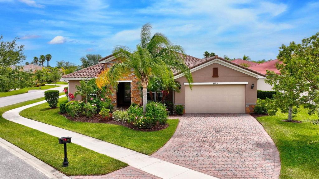 Photo of 11251 SW Apple Blossom Trail, Port Saint Lucie, FL 34987 (MLS # R11104206)