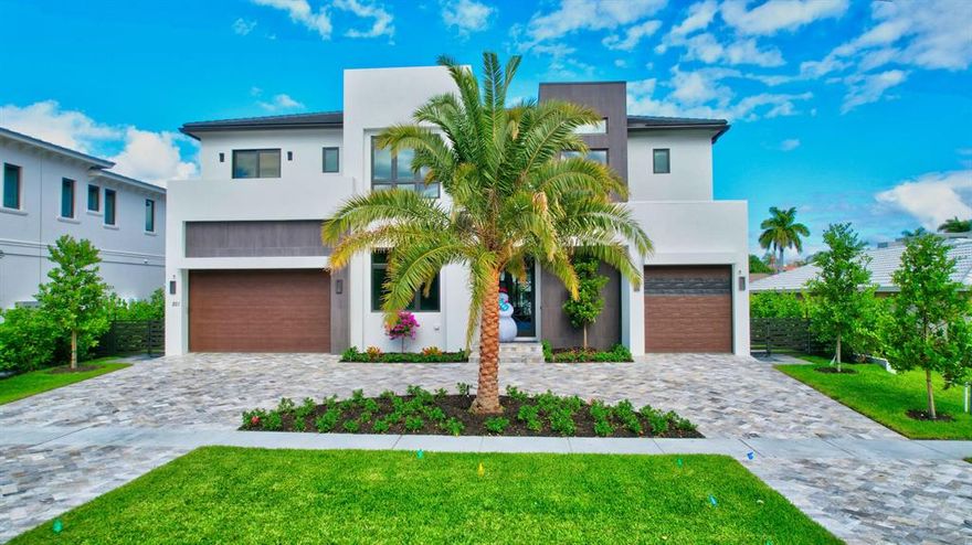 Bring your 80 ft Yacht and walk to the beach from this intracoastal view no fixed bridge brand new deepwater estate. Expected completion of the house is October  2021. This Brand New Lake Rogers Isle Estate Built By Elysee Homes a premier Boca Raton Builder even comes with a full house generator and elevator and a 50 ft concrete dock.