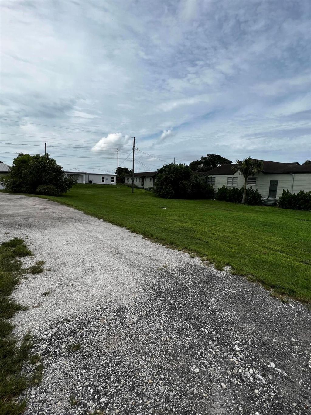 Photo of 934 N Main Street, Belle Glade, FL 33430 (MLS # R10927419)