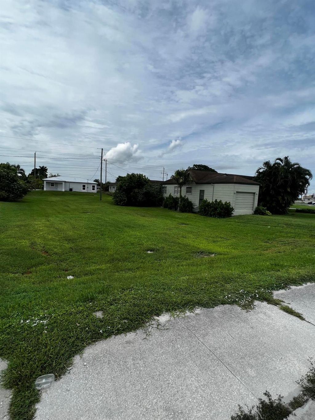 Photo of 934 N Main Street, Belle Glade, FL 33430 (MLS # R10927419)