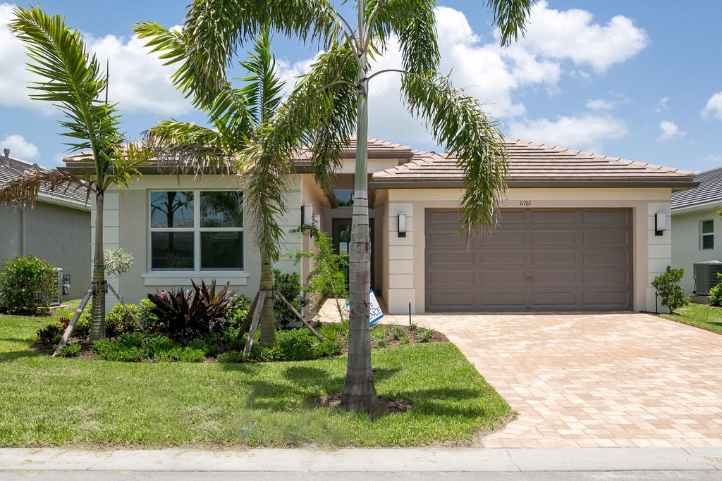 Photo of 11765 SW Poseidon Way Way, Port Saint Lucie, FL 34987 (MLS # R10818051)