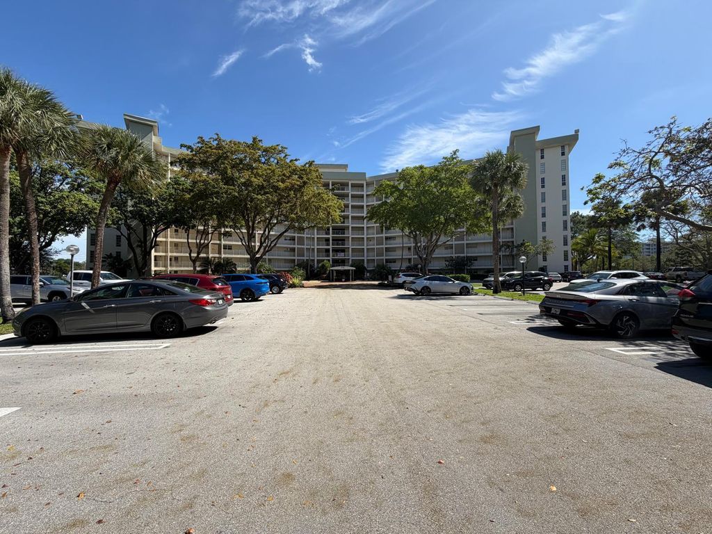 Photo of 3051 N Course Drive #509, Pompano Beach, FL 33069 (MLS # B26005170)