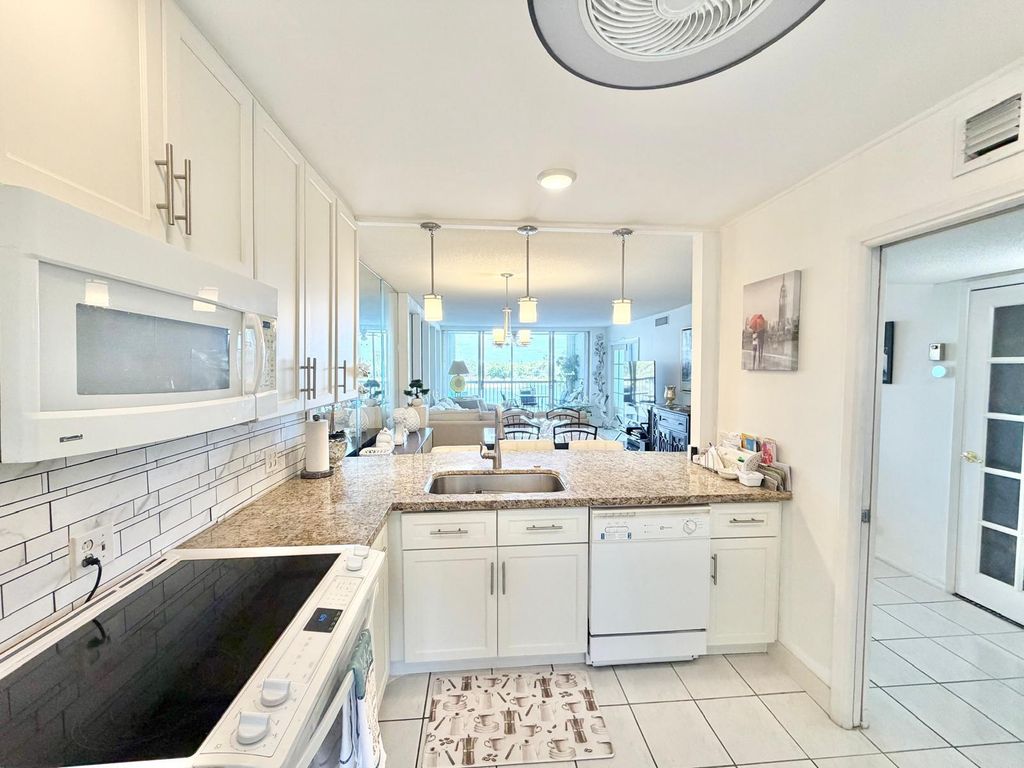 Photo of 3051 N Course Drive #509, Pompano Beach, FL 33069 (MLS # B26005170)