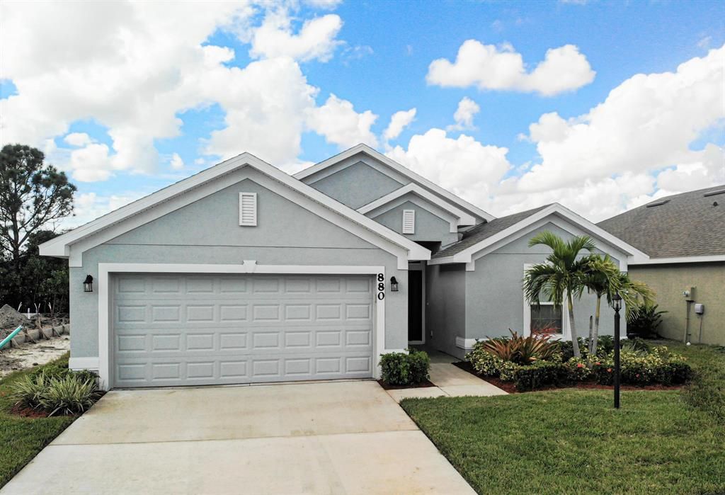 Photo of 880 NE Whistling Duck Way, Port Saint Lucie, FL 34983 (MLS # R10748902)